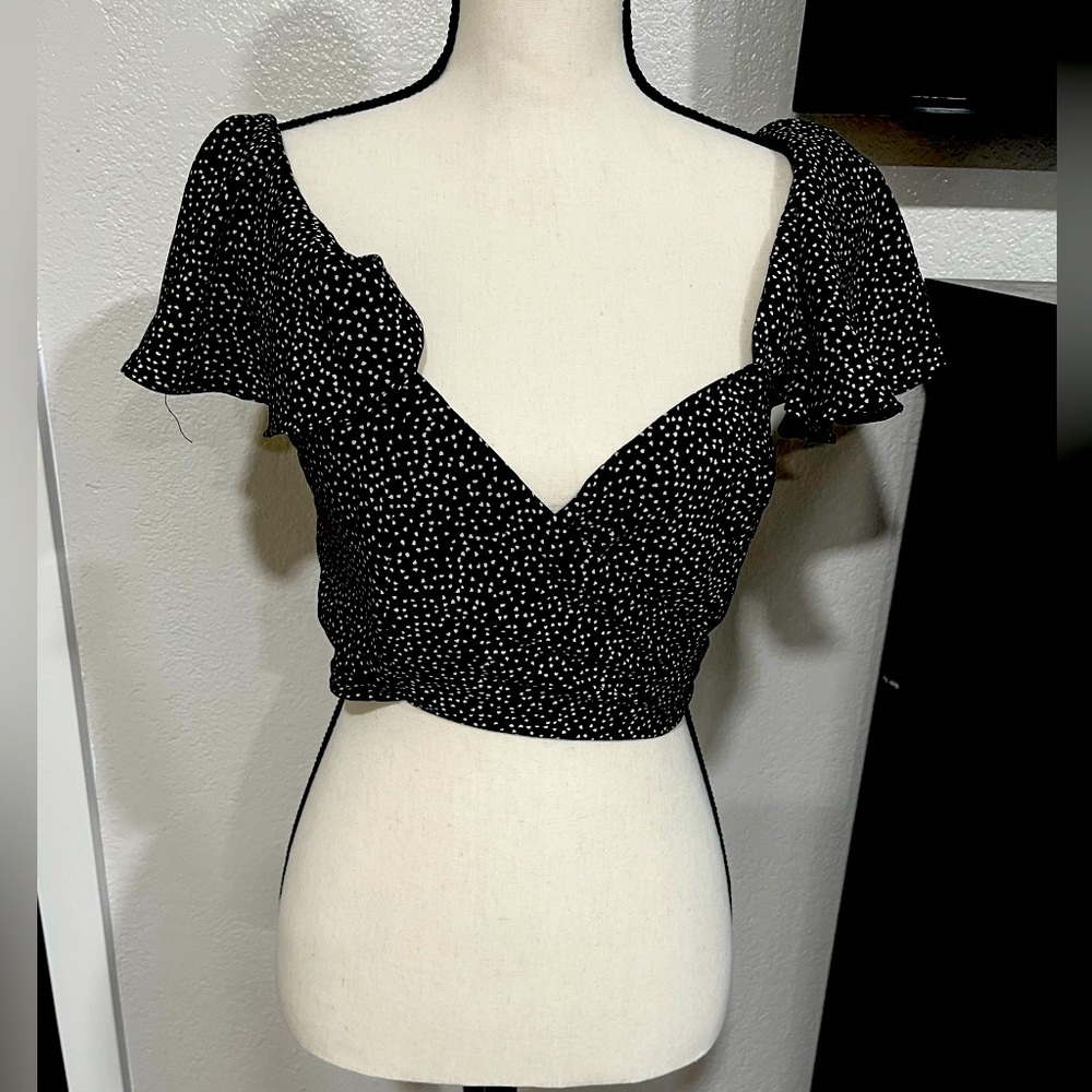 Luxxell black and white wrap around blouse